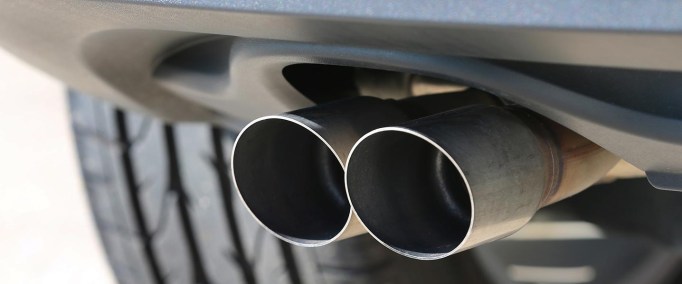A view of a car exhaust of a VW Tiguan TDI car model in Kaufbeuren, Germany, 21 September 2015. Volkswagen's shares plunged on 21 September 2015 after US environmental protection authorities threatened to impose fines of up to 18 billion dollars on the carmaker, following its admission of systematically cheating US air pollution tests. A spokesperson of VW confirmed on Monday, 21 September, that VW has suspended the sale of diesel powered cars with four-cylinder engines of car models VW and Audi in the US for the time being, due to the recent scandal involving manipulated data of emission tests. Photo by: Karl-Josef Hildenbrand/picture-alliance/dpa/AP Images